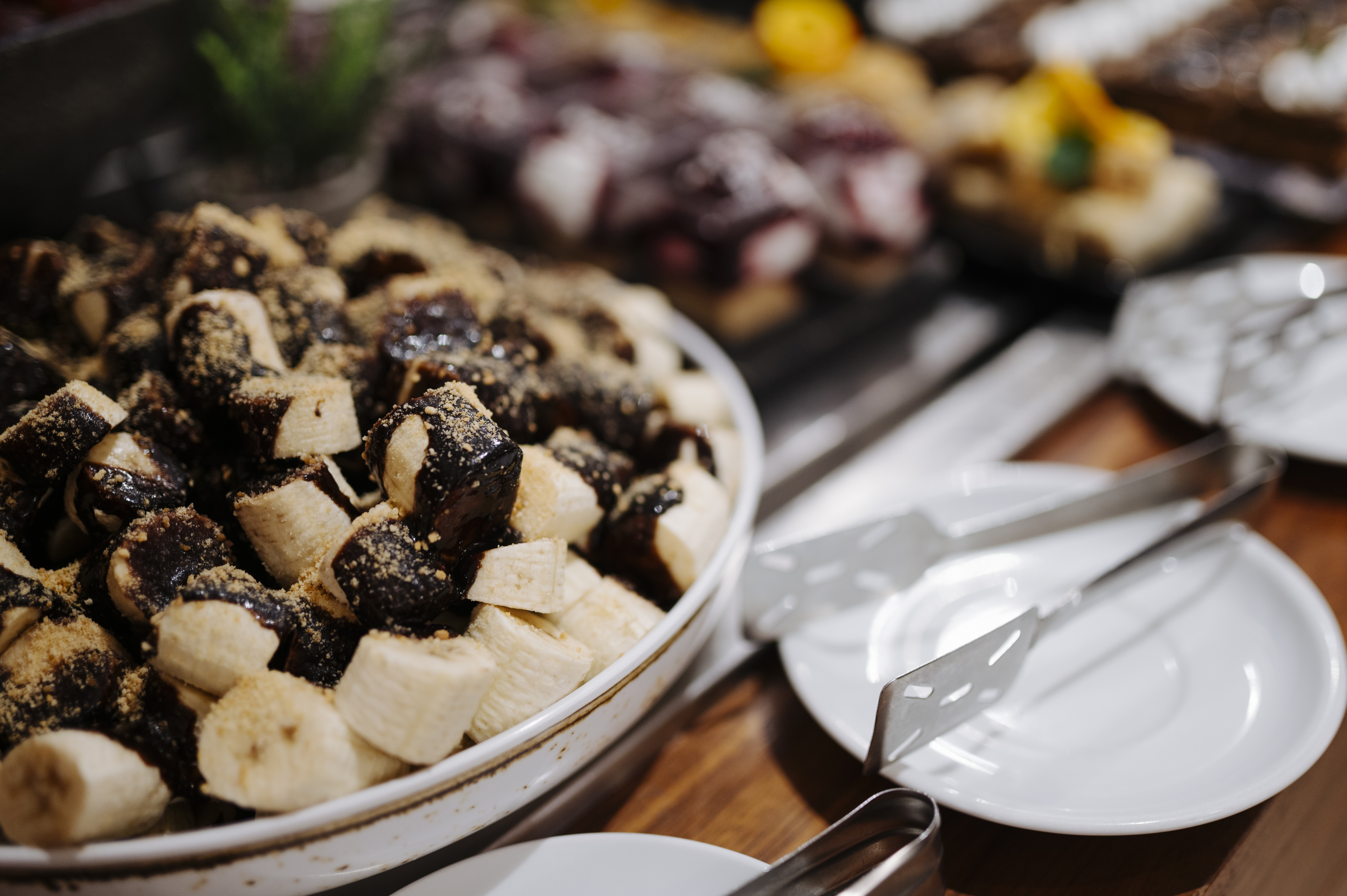 A catering spread of Indian-fusion appetizers and mains on platters