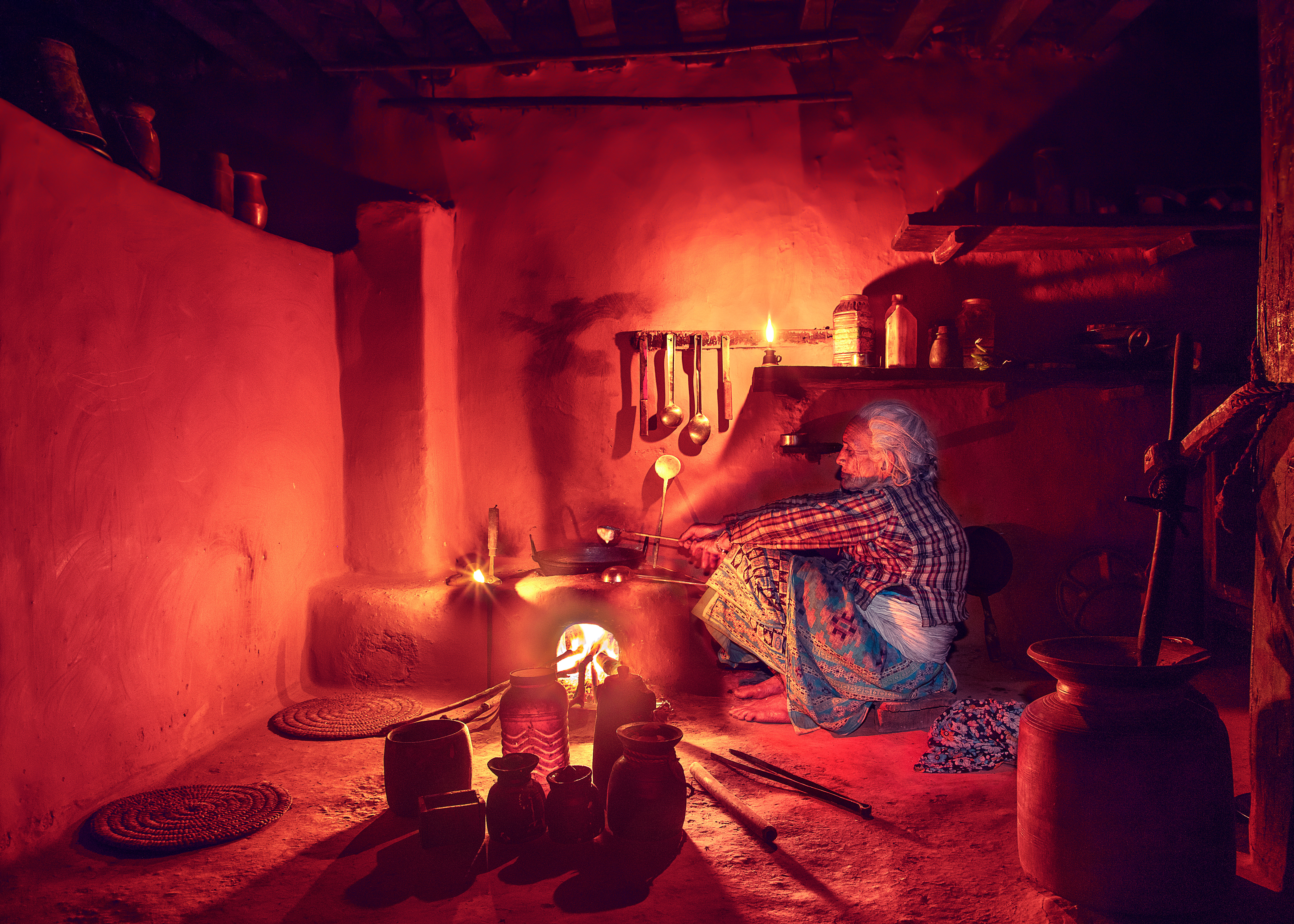Black and white photo of a traditional home kitchen, representing the family kitchen where Manjeet's recipes began