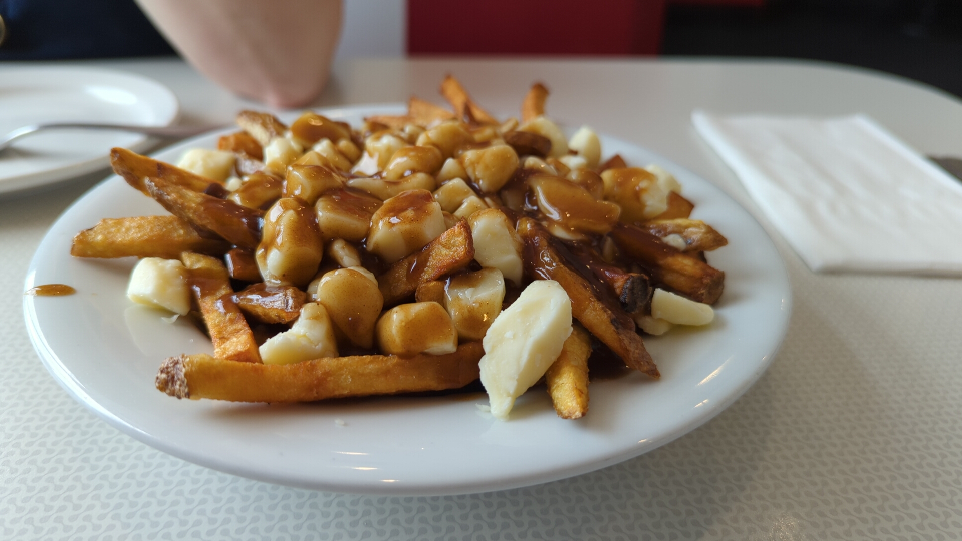 Loaded fries topped with curry gravy and cheese